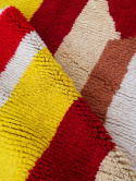 Red and yellow wool rugs