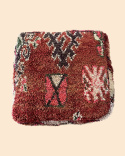 Woolen pouf with colorful motifs